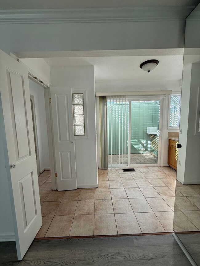 Building Photo - Hard floors, extra closets, patios & fenced yard