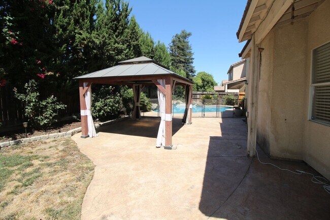 Building Photo - Cute Two-Story Home With Pool & RV Parking