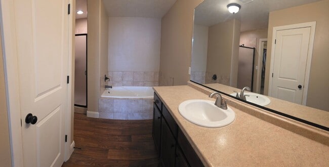 Building Photo - Spacious 4-Bedroom Home in Highly Sought-After Summerfield Community!