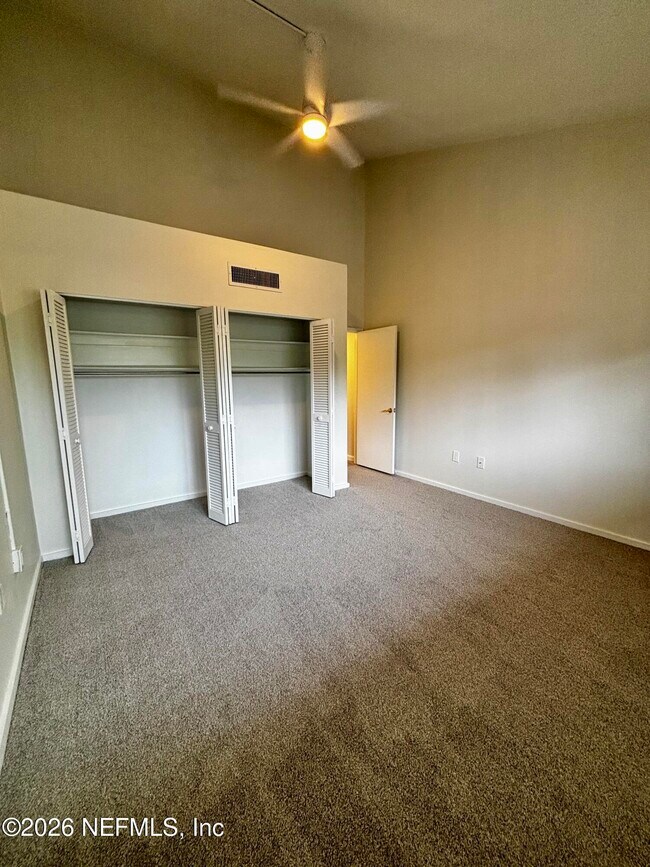 Building Photo - 9787 Sawgrass Dr E