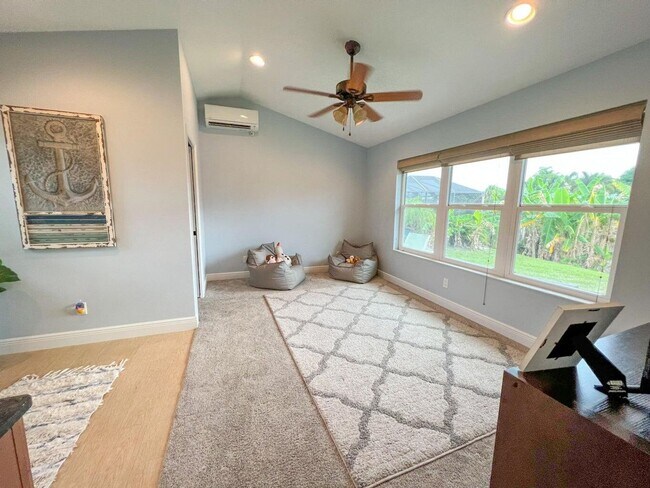 Building Photo - Palm City Home with Dock and Lift