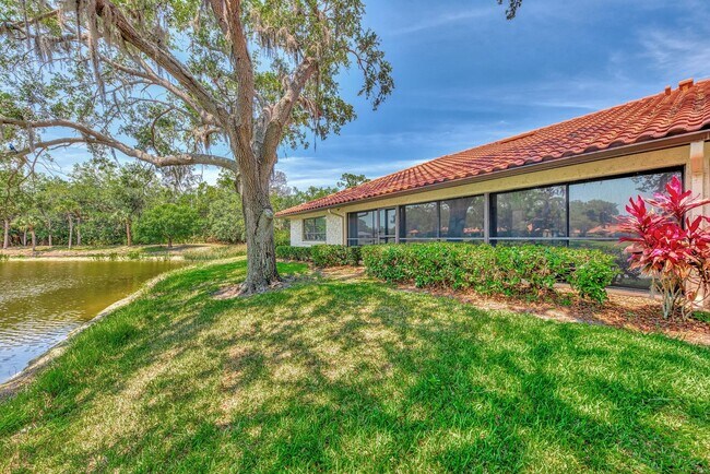 Building Photo - BEAUTIFUL 2 BEDROOM 2 BATHROOM + A DEN VILLA WITH GORGEOUS LAKE VIEWS!