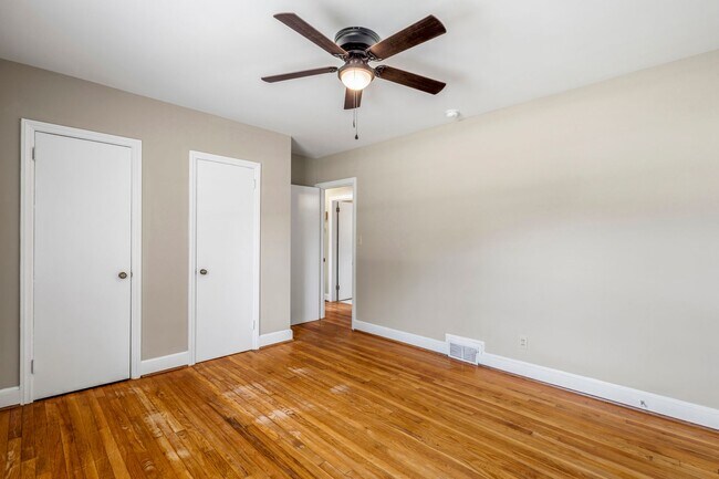 Building Photo - Large Renovated Ranch Home, Two Kitchens & Two Living Areas, Hardwood Flooring, Deck, Fenced!