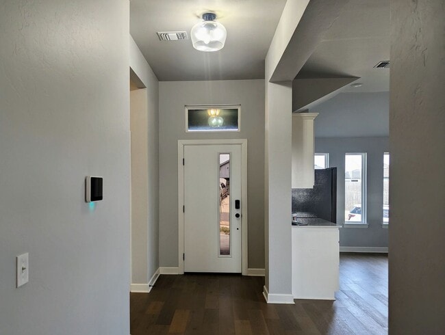 Building Photo - Spacious Yukon Home with Storm Shelter, 2-Car Garage & Fenced Yard!