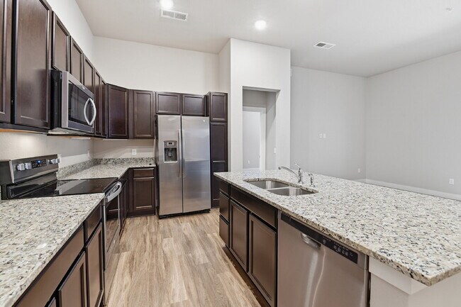 Building Photo - $1,640.95, 2-bed, 2-bath condo located in Aurora.