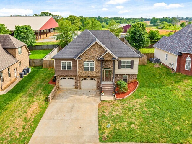 Building Photo - Spacious 4-Bedroom Home with Dual Living A...