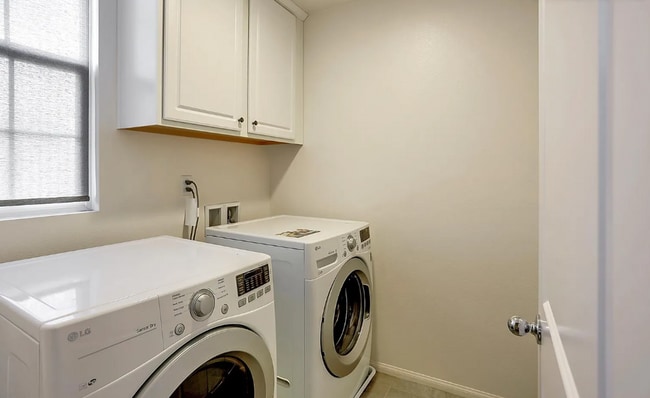 Building Photo - This gorgeous 3-bedroom, 3.5 bath townhome...