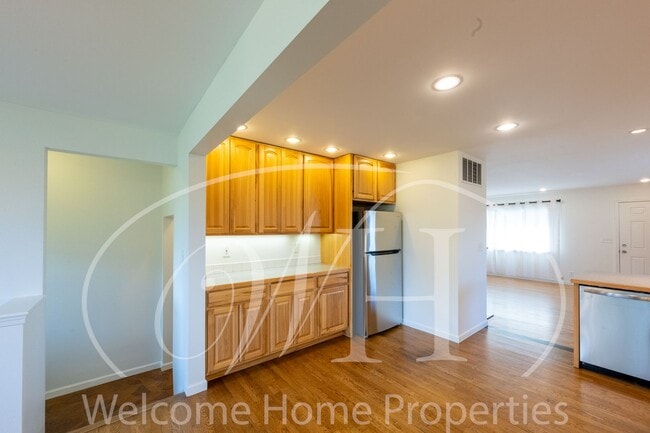 Building Photo - Spacious 5 Bedroom Home with Fenced Yard & Covered Parking