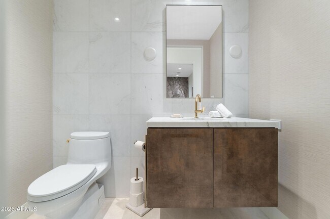 Building Photo - 6587 N Palmeraie Blvd