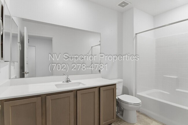 Building Photo - NW! 3 Bedroom Townhouse!! Gated!! Parks!! All Tile Floors Downstairs!! 2 Car Garage!!!