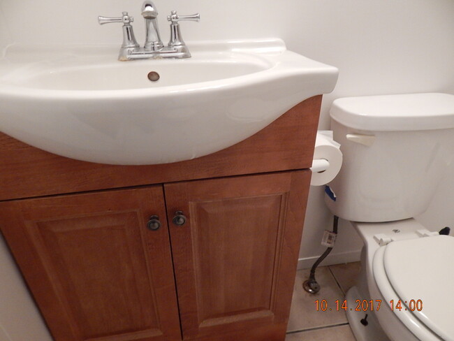 Clean updated bath w/ storeage space - 719 Johnson Ave