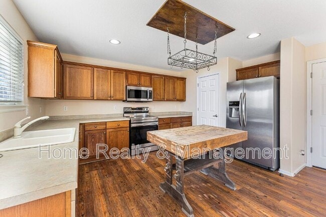 Building Photo - 6380 E 139th Ave