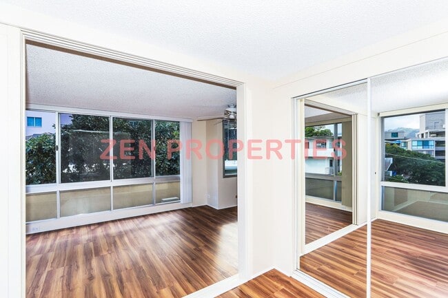 Building Photo - 2 bedroom, 1 bath unit with 1 parking stal...