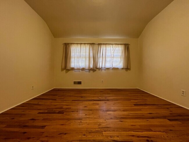 Building Photo - Bi-Level House w/ Massive Backyard, Storage, & Character!