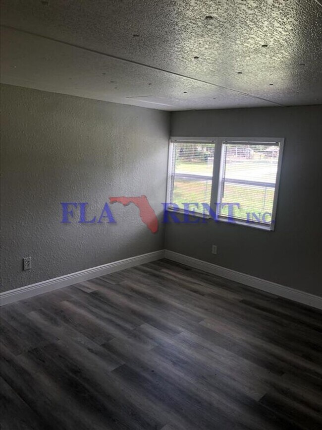 Building Photo - Coming Soon....3/2 Manufactured home with fenced in yard/ Bithlo area