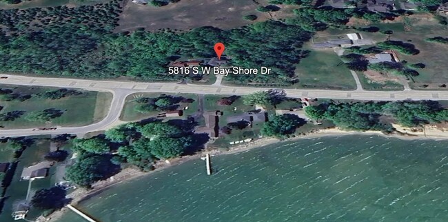 Building Photo - Charming 3+ Bedroom Cape Cod with Water View – Between Traverse City & Suttons Bay