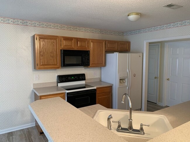 Building Photo - Beautiful Home located in the Brynmoor Com...