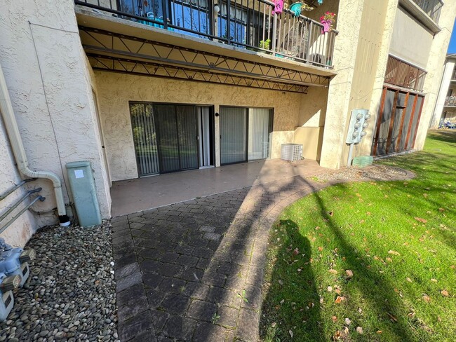 Building Photo - CONDO 2 BR walk out patio in Flying Hills ...