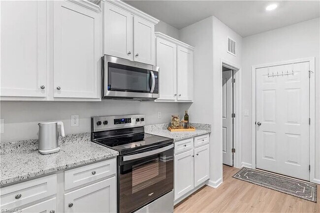 Building Photo - Earn Wealth While Leasing - Like a Homeown...
