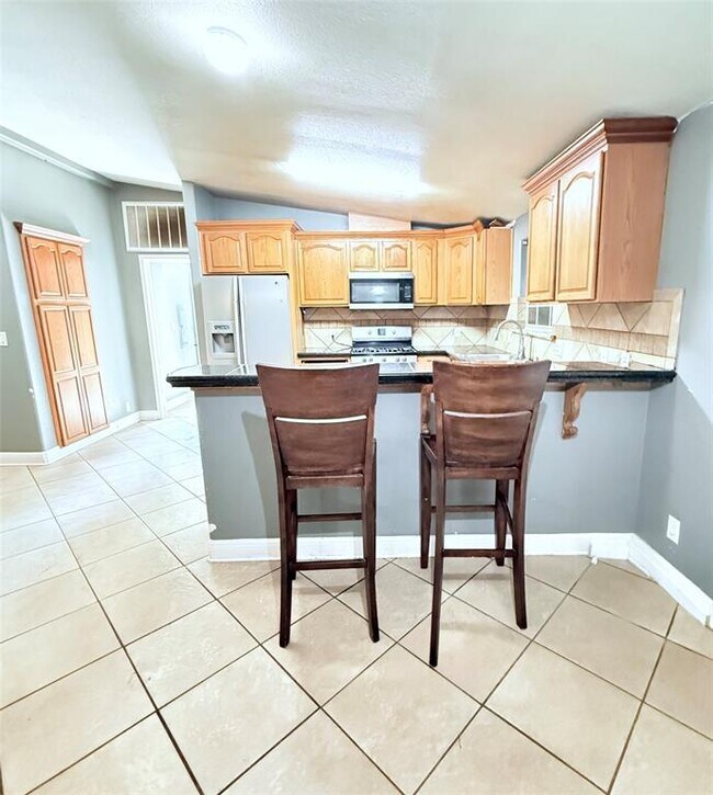 Building Photo - 11809 Garden Gate Dr