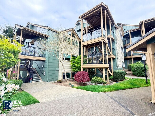 Building Photo - Updated 2 Bed Condo Near the Narrows – Water Views, Covered Parking & Prime Tacoma Location!