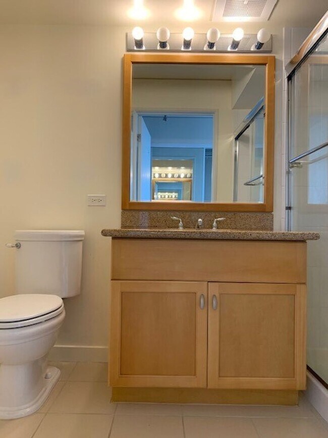 Building Photo - Moana Pacific - 2 bedroom plus den, 2 bath Condo with 2 parking - avail now!
