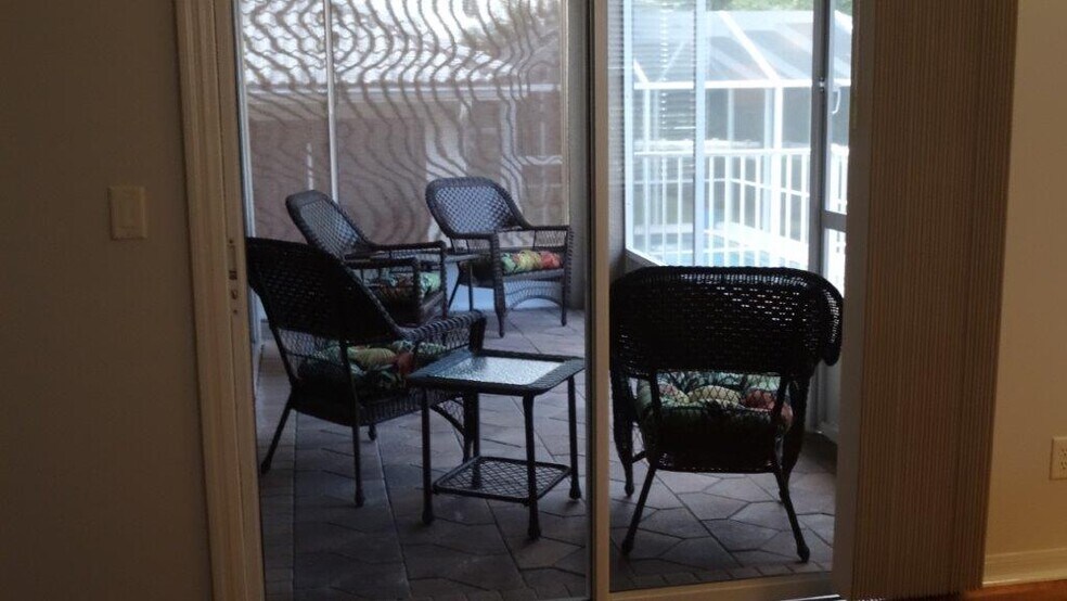 Slider from Master bedroom to covered/screened lania - 979 West Skyview Crossing Drive