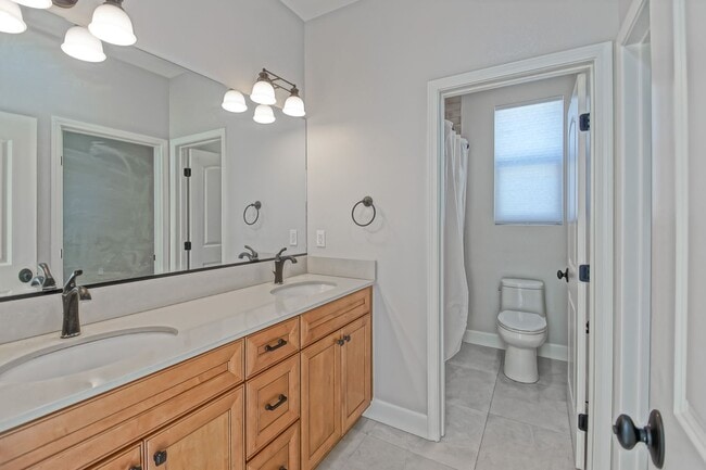 Building Photo - BUILT IN 2019: SPACIOUS & BRIGHT, DETACHED TOWNHOUSE W/ 2-CAR GARAGE & FENCED YARD IN GREAT RESID...