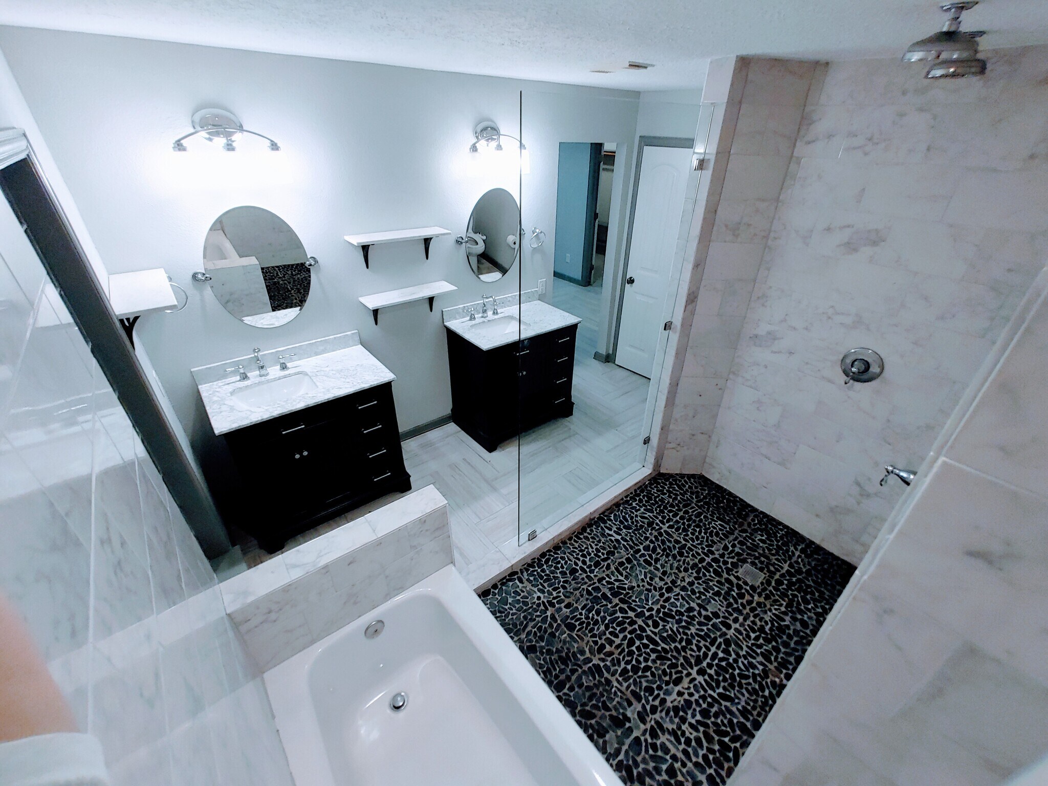 Double vanities with carrara marble sinks and shelves - 2 Arnica Ct
