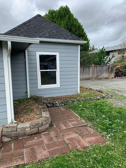 Flower bed before fence - 5501 108th Avenue Ct E