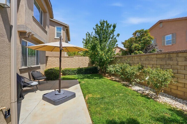 Building Photo - Highly Sought-After Next Gen Home with Private Downstairs Suite in Gated Valencia Community