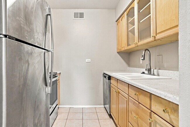 Building Photo - $1,645.95 with Half Off The First Month's Rent, 2 Beds - 1 Bath, Condo in Denver with Central A/C!