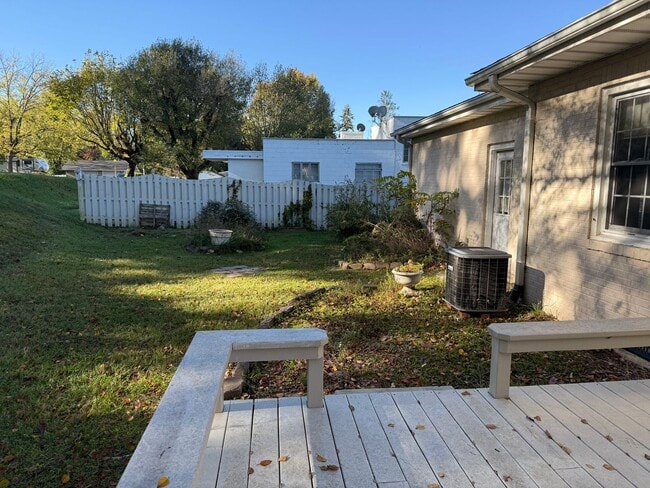 Building Photo - One Level Home! 3or 4 bedroom 1 bath with extra-large den, garage and extra storage on almost an ...