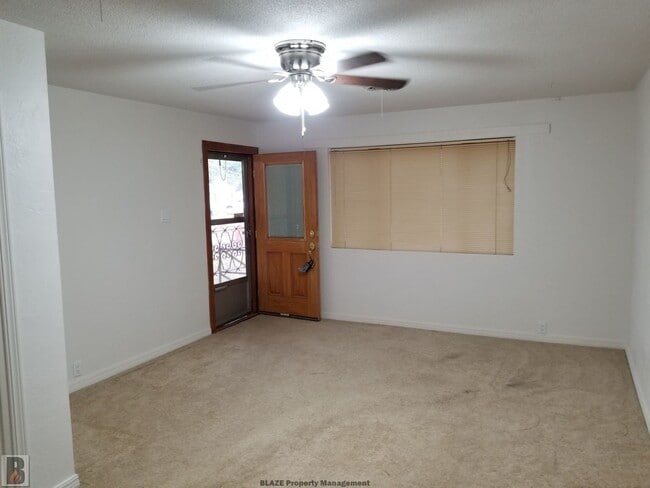 Building Photo - Massive Corner-Lot Home with Retro Charm & Shady Backyard!