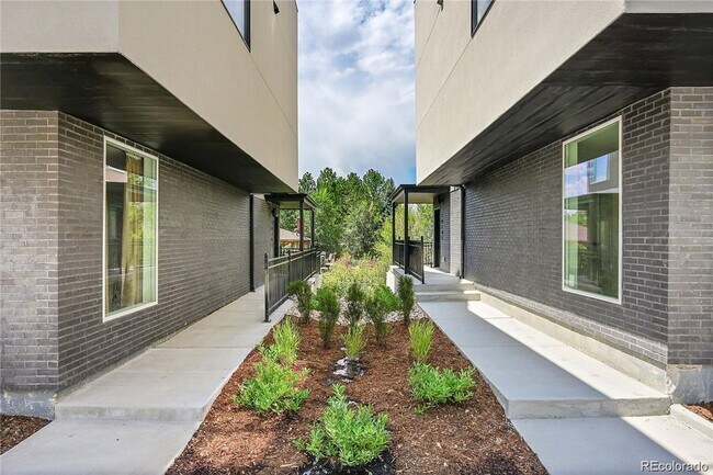 Building Photo - New Construction 3-Bedroom Townhome with Rooftop Deck & Mountain Views