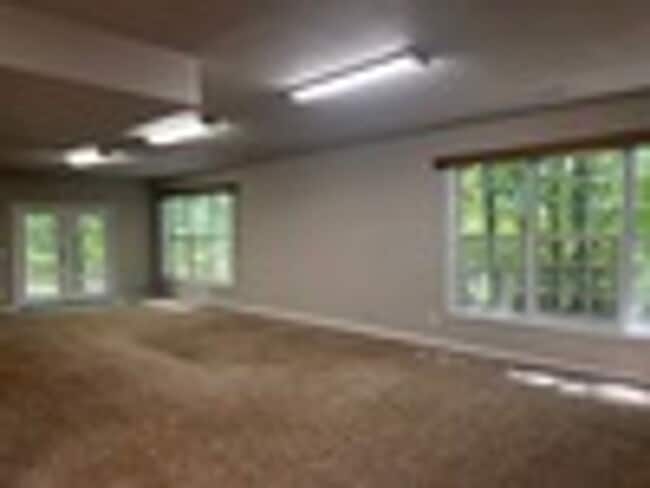 Building Photo - Great home with 2 separate entrances & a Fenced in yard!