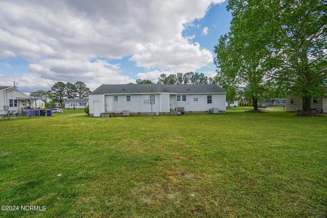 Building Photo - Lawn Care Included in Jville City Limits!