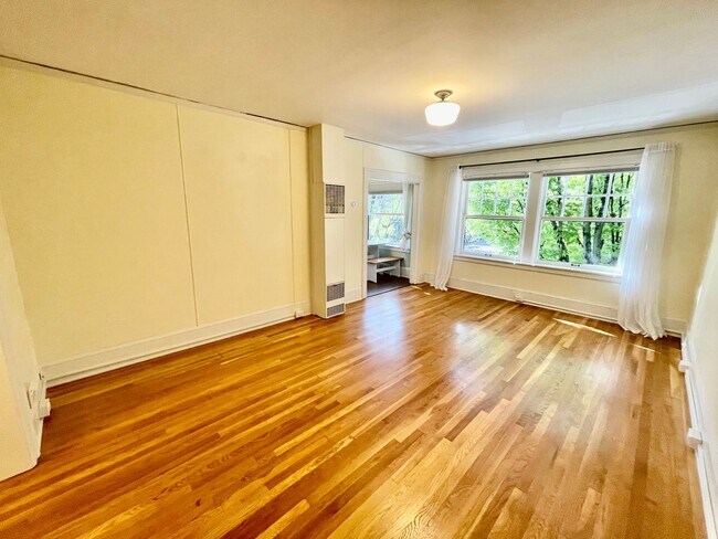 Building Photo - 1/2 Month Free! Cheerful, Spacious Studio ...