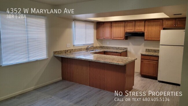 Building Photo - Remodeled 3 Bedroom Townhome off 43rd Ave ...
