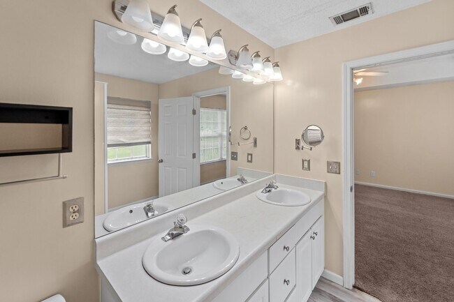 Building Photo - Beautiful 4-Bedroom Home with Lagoon Views in Pooler's Arbors at Godley Station