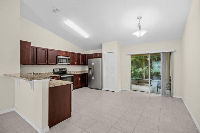 Building Photo - 8736 98th Ct