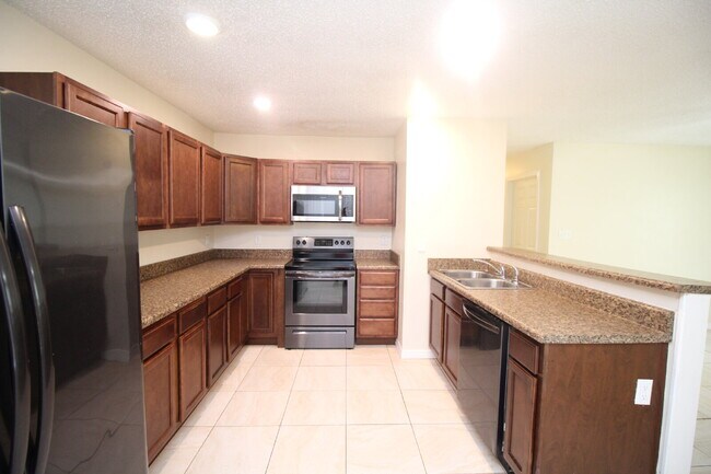 Building Photo - West Pensacola Duplex Living — 3BR Home with Open Floor Plan, Eat-In Kitchen, Covered Patio & Low...