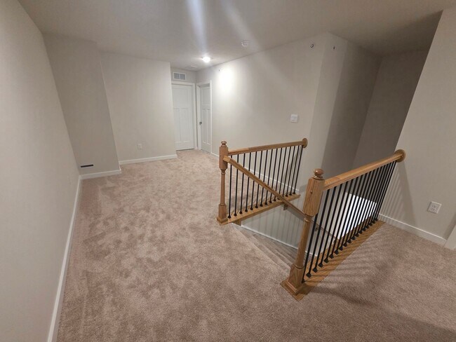 Building Photo - Luxury 4-Bedroom Townhome with Finished Walkout Basement & River Views