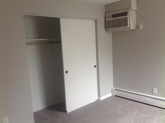 Master bedroom closet & wall A/C unit - 4906 Chalet Dr
