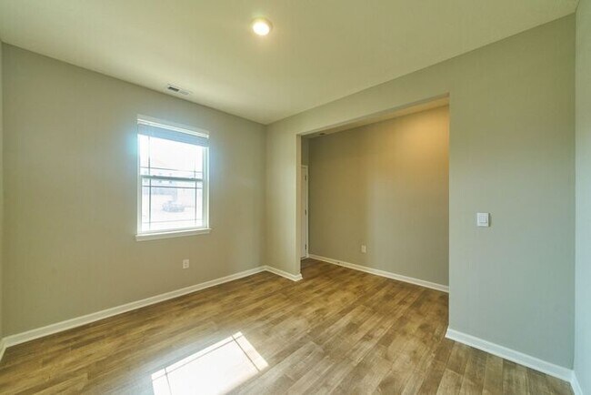Building Photo - 4 Bedroom at Trotter's Landing in Camby With Pond View!