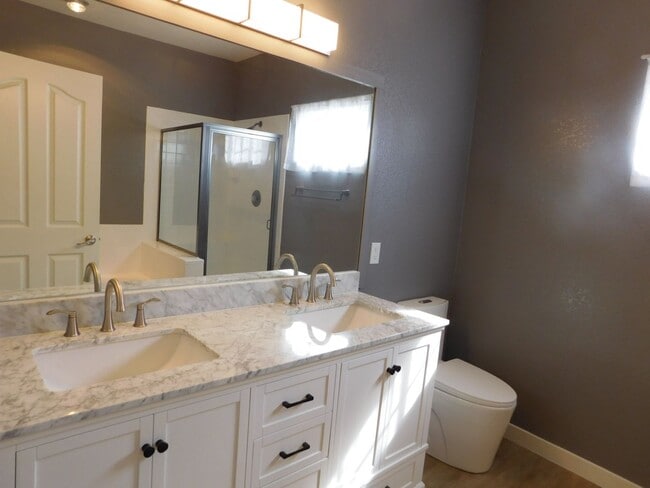 Building Photo - Gorgeous 3 bedroom condo with a 2 car garage! Tons of upgrades*Southwest*Gated community*