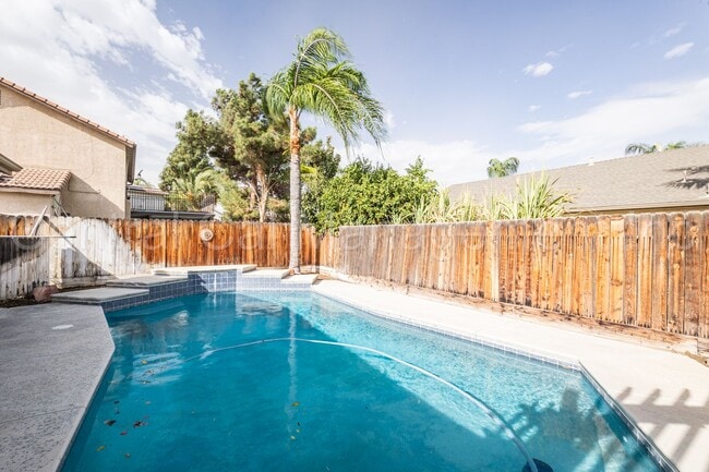 Building Photo - 3 Bedroom/2 Bath with a Pool and Solar - $...