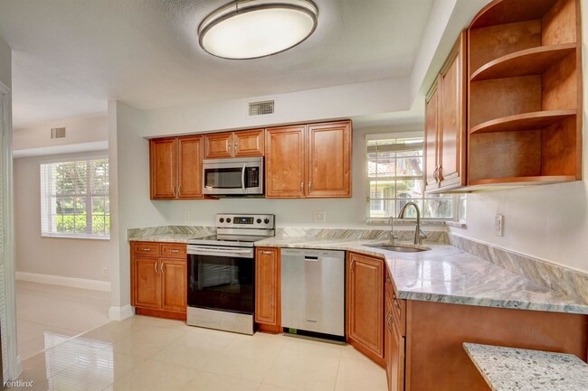 Building Photo - 3 br, 2 bath Condo - 17266 Boca Club Blvd ...