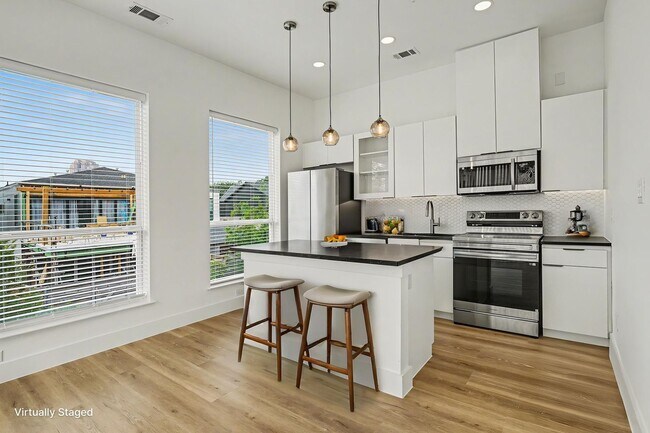 Building Photo - Be the first to live in Unit 205 at 2217 Fitzhugh—a brand-new 2026 construction offering 597 sq f...