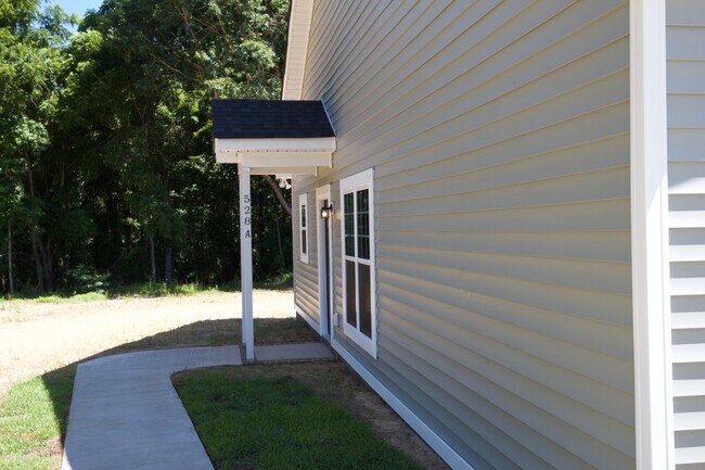Building Photo - "Brand New Construction."  Quiet location, charming, cozy 3 bedroom duplex